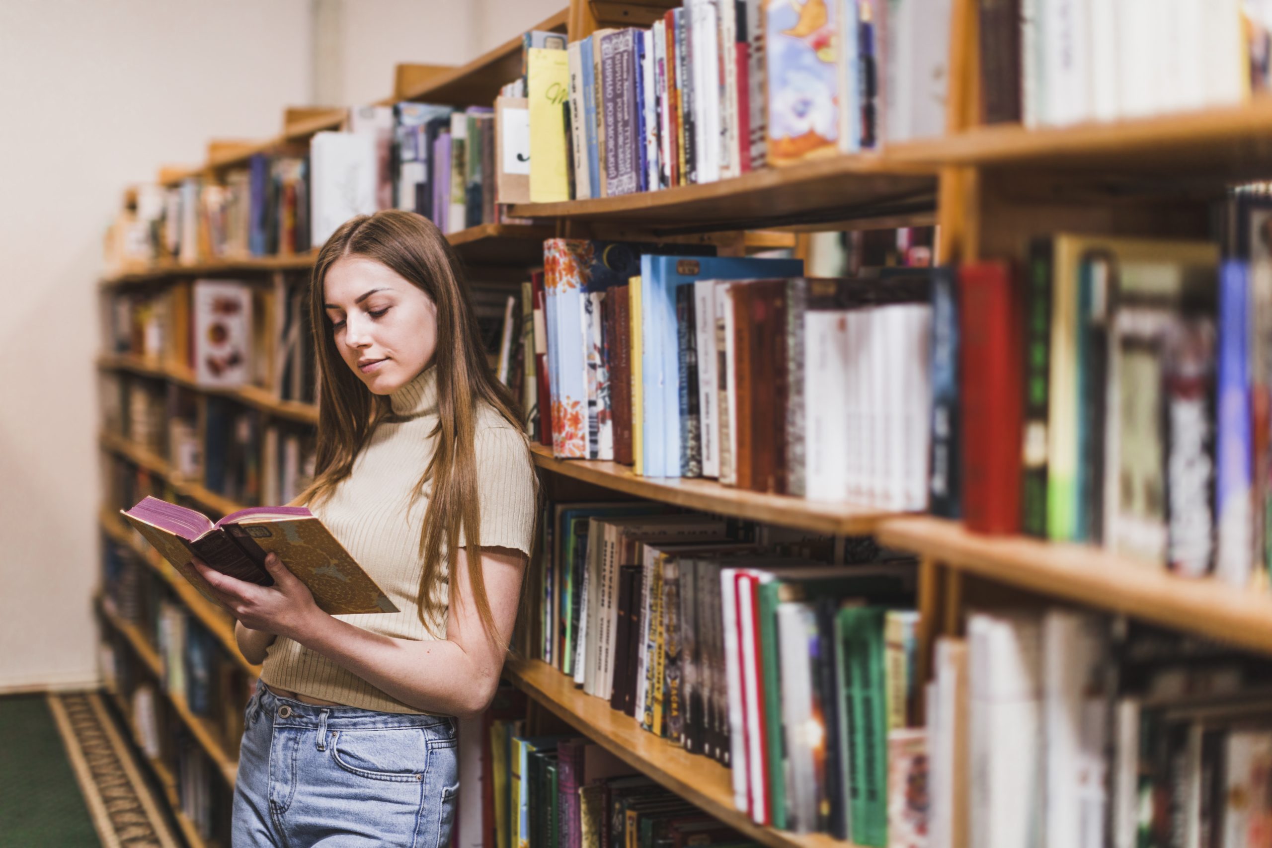 back-school-concept-with-woman-studying-library